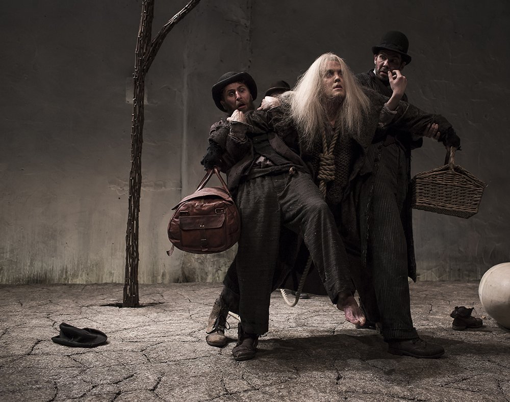 Aaron Monaghan as Estragon Garrett Lombard as Lucky and Marty Rea as Vladimir in Druids production of Waiting for Godot by Samuel Beckett directed by Garry Hynes. Photo Matthew Thompson-An-Grainan