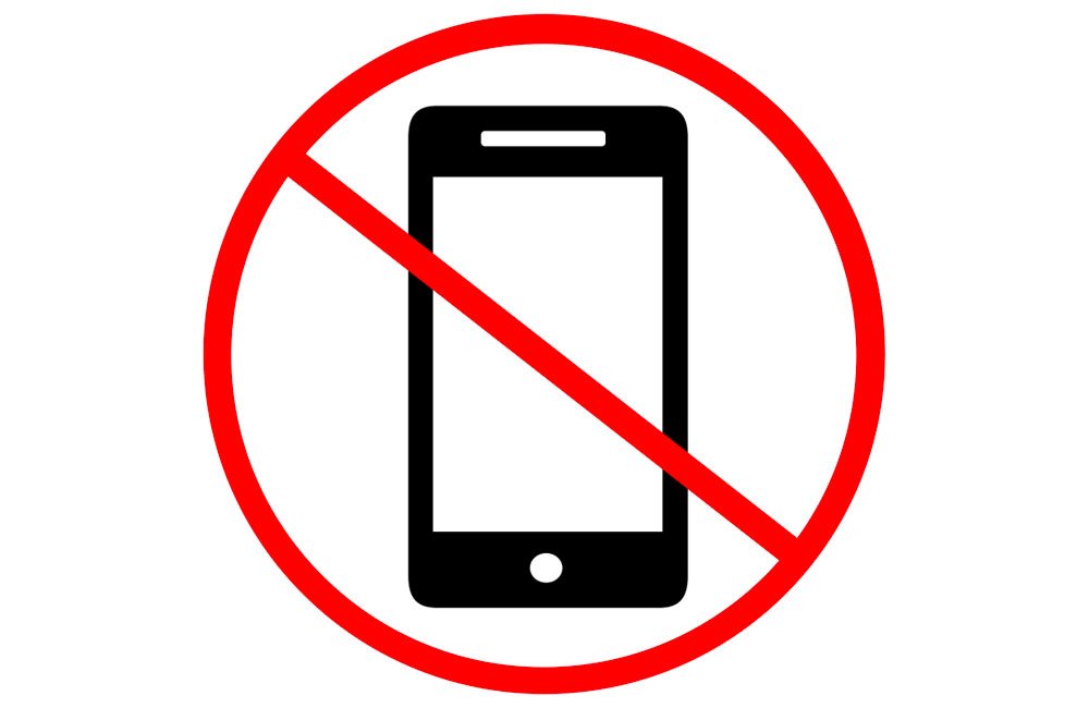 Illustration of a mobile device with a no entry symbol on top of it.