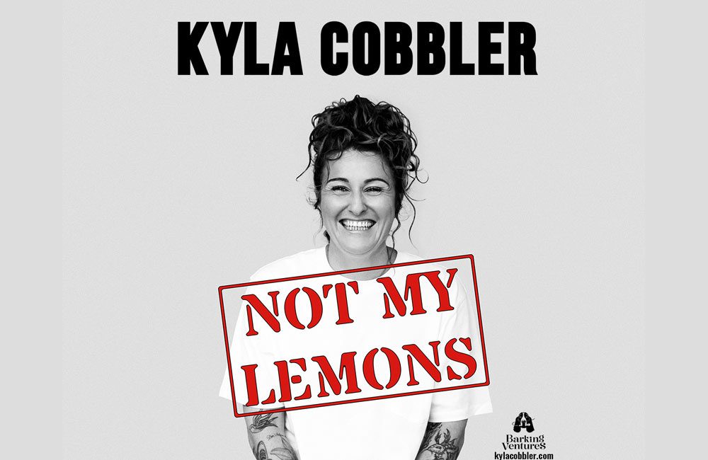 A black and white image of comedian Kyla Cobbler.